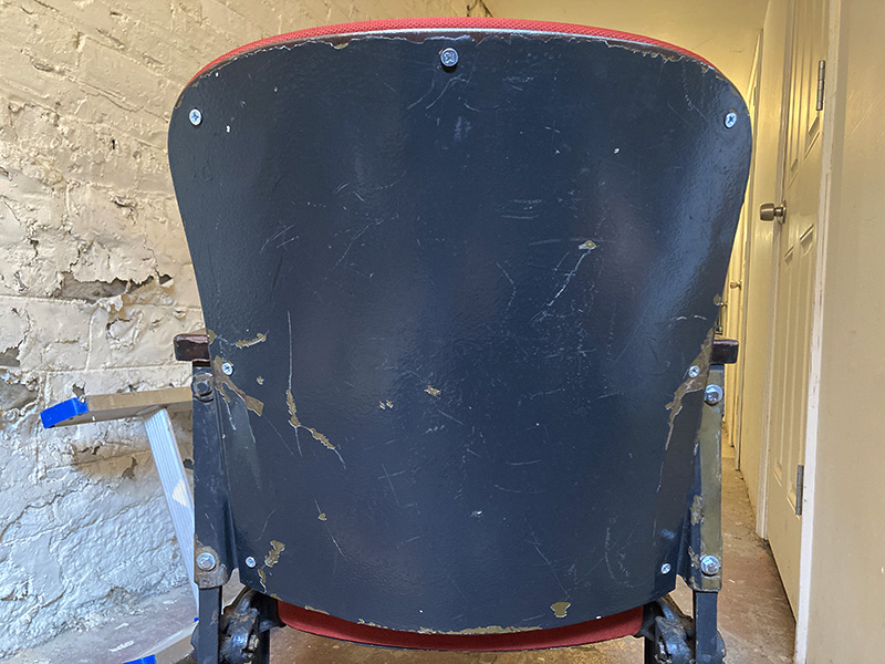 Photo of the attached back with screws