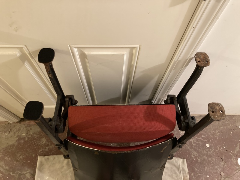 Photo of the seat upside-down with two felt gaskets attached