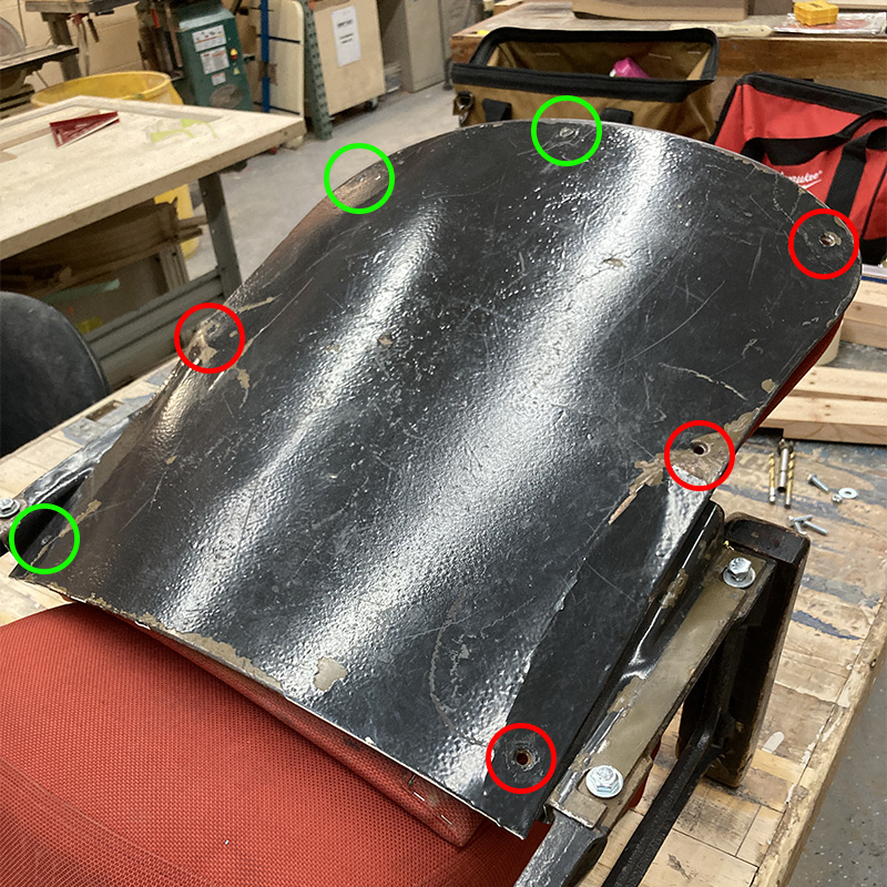 Photo with missing screws circled