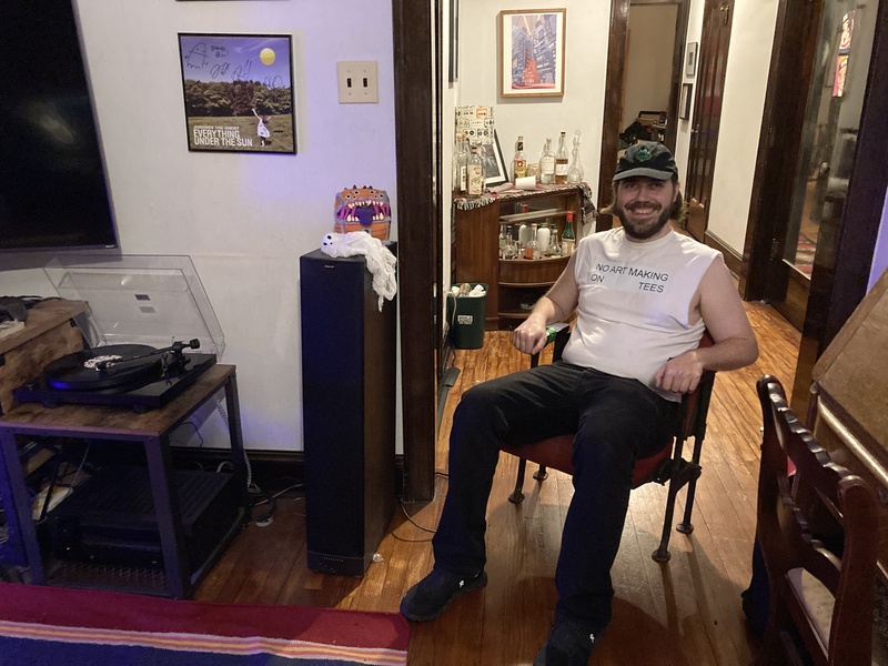 Photo of my friend sitting in his new seat