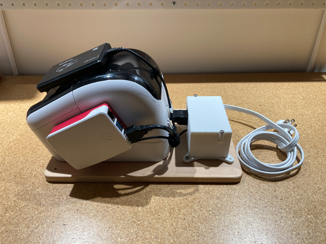 Photo of the nametag printer before hand-off