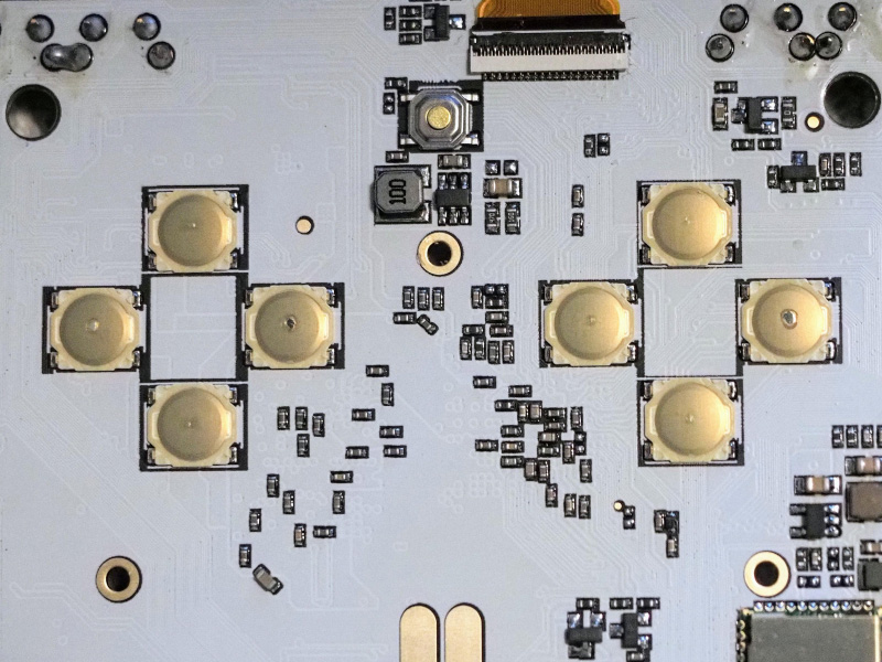 Photo showing damage to all dome switches on the RG35XXSP PCB