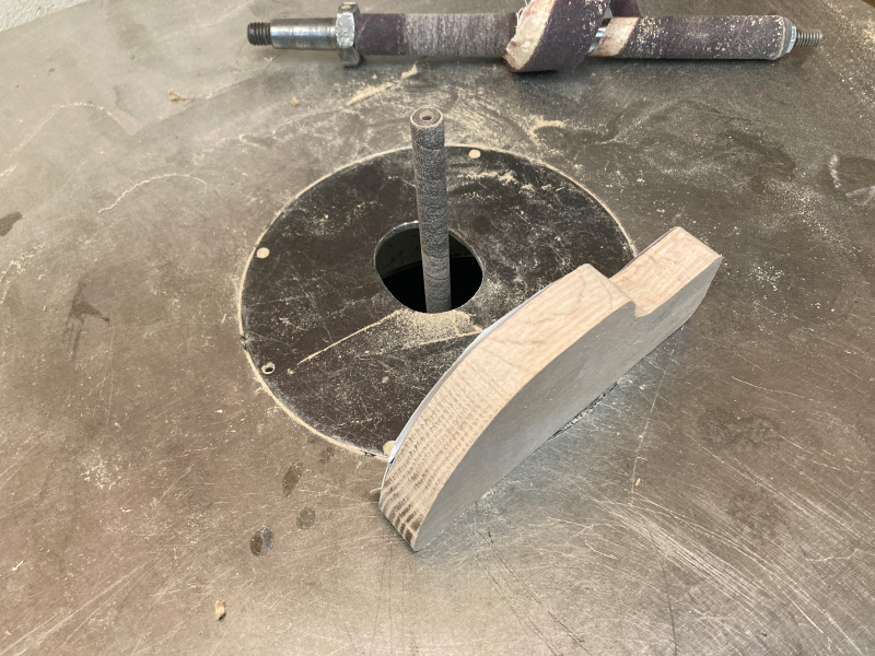 Photo of wood next to a drum sander